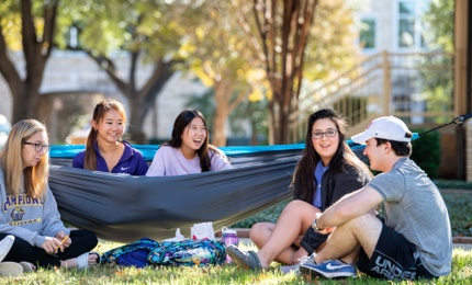 Students enjoying a nice day outside on campus